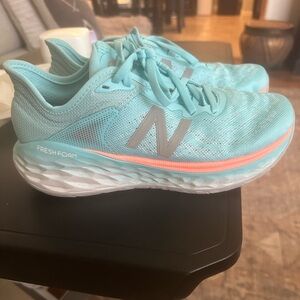New Balance Women's Mint Green Athletic Sneakers with Blue Insole